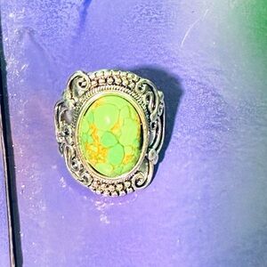 Elegant Silver and Green Gemstone Ring